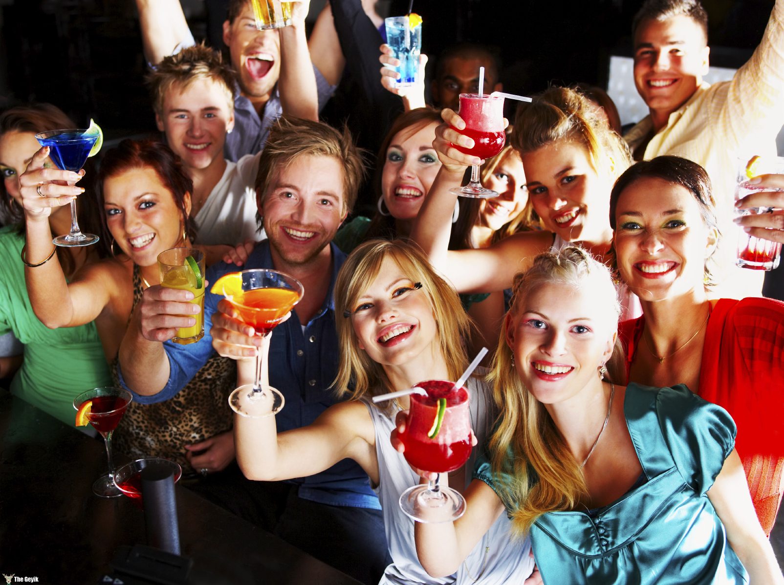 A group of young people enjoying cocktails